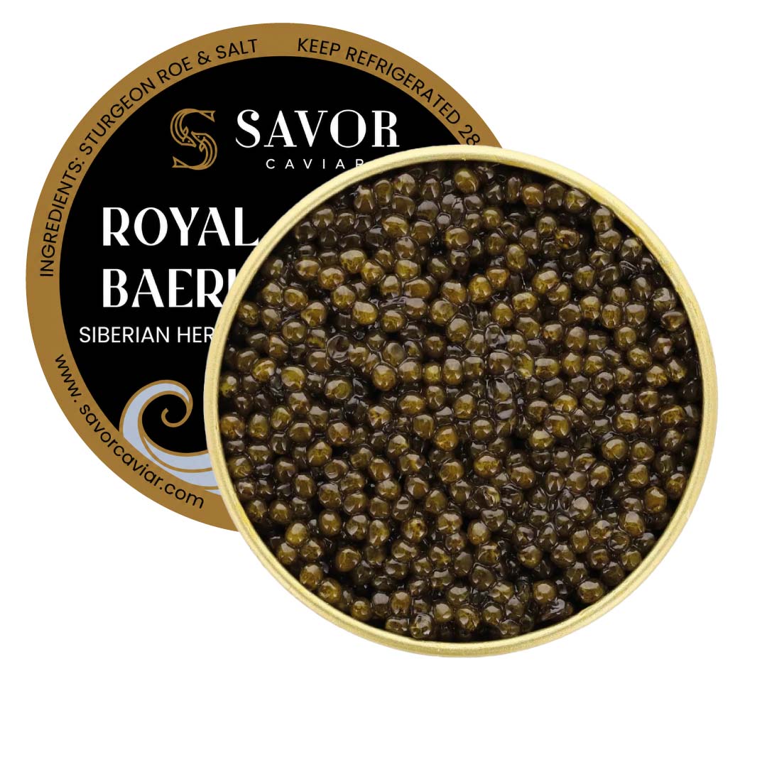 Open 125 g tin of Royal Baerii caviar featuring medium to large olive-brown Siberian sturgeon roe pearls alongside Savor Caviar black and gold product label on a light background. #size_125g