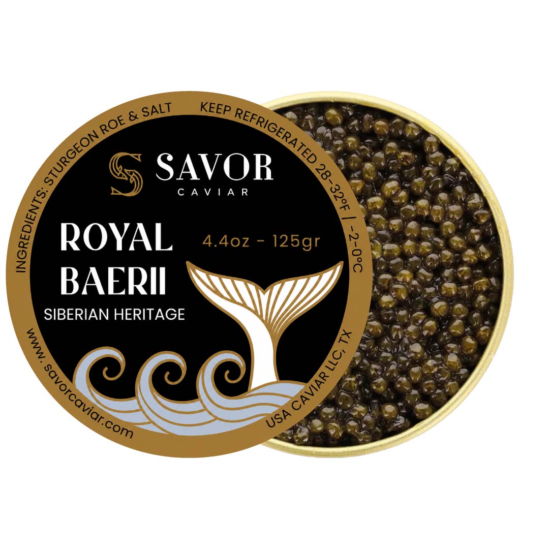 Open 125 g tin of Royal Baerii caviar featuring medium to large olive-brown Siberian sturgeon roe pearls alongside Savor Caviar black and gold product label on a light background. #size_125g