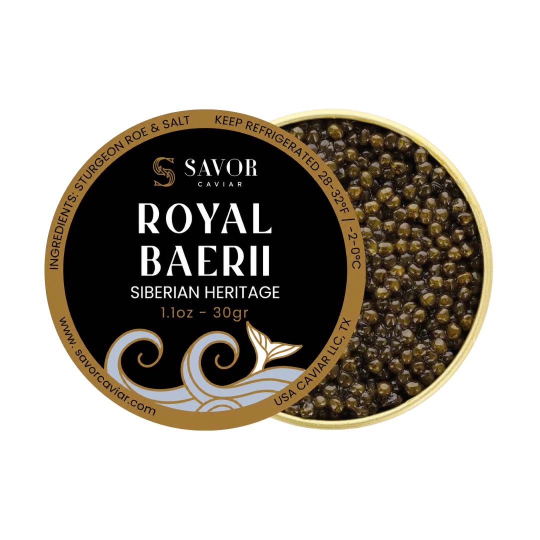 Open tin of Royal Baerii caviar featuring medium to large olive-brown Siberian sturgeon roe pearls alongside Savor Caviar black and gold product label on a light background. #size_30g